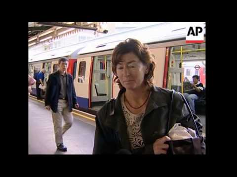 Station hit by July 7 bomb reopens for first time in three weeks