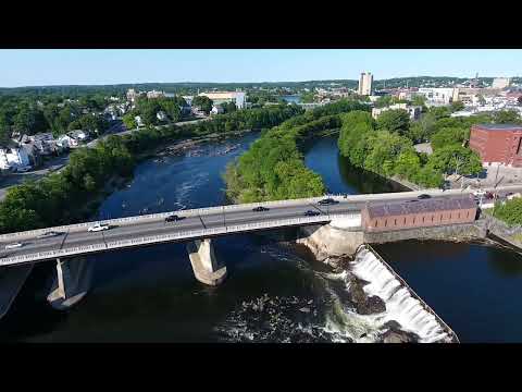 Aerial Drone Video of Lowell, Massachusetts: Discover the Scenic Merrimack River with Cityscape View