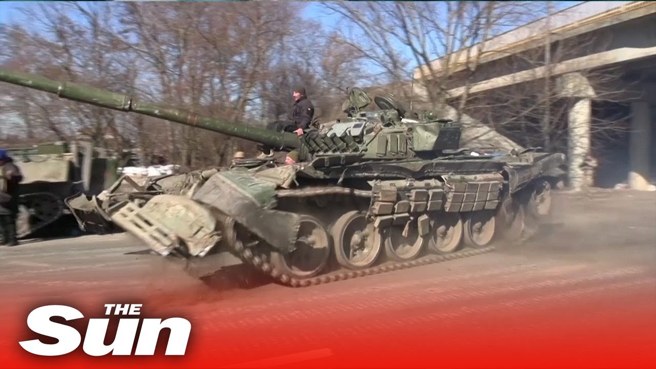 Ukrainian soldiers seize Russian tanks after 'taking down convoy'