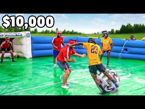 World's BIGGEST Slip N Slide Football Competition