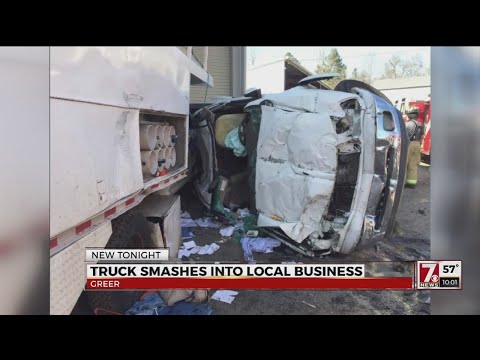 Surveillance video captures truck smashing into storage business in Greenville Co.