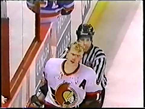 Mathieu Schneider TKO's Daniel Alfredsson