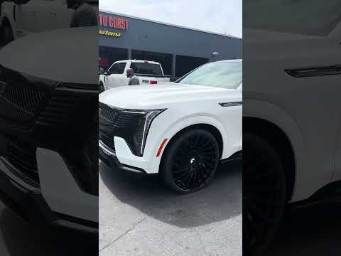 Customer Happy with His Escalade IQ on 28's Here at Coast 2 Coast Customs: