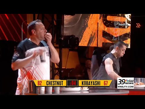 Joey Chestnut Breaks Own Hot Dog-Eating Record with 83 Dogs