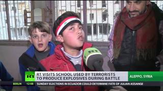 RT visits Aleppo school used by jihadists to manufacture & store explosives
