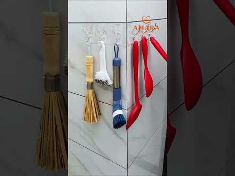 Adhesive white plastic hook hanger