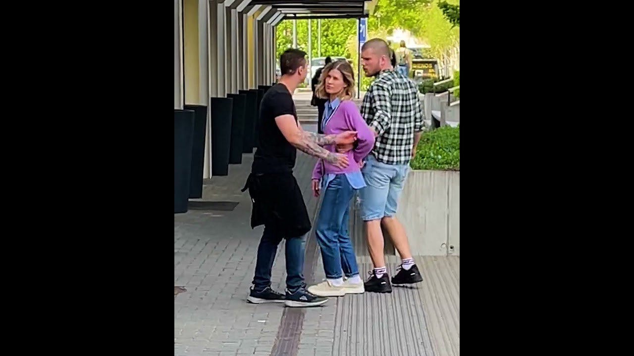 A young woman send a signals for help