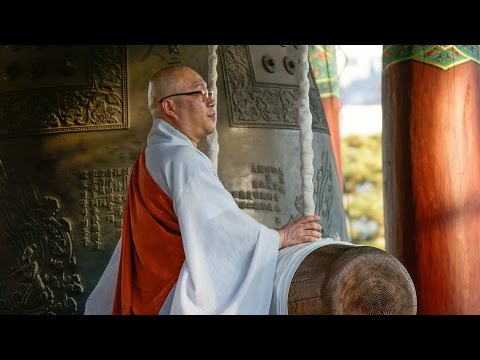 Ringing the bell in Buddhist Temple, Korea