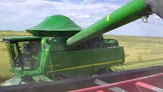 preview picture of video 'Colheita 2014 - John Deere STS 9670 em Arrozeira Banhado - Arroio Grande/RS'