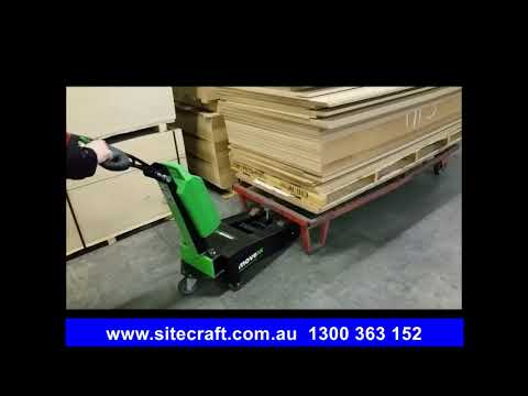 Movexx T1000-P Battery Electric Tow Tug Moving A Timber Transport Trolley