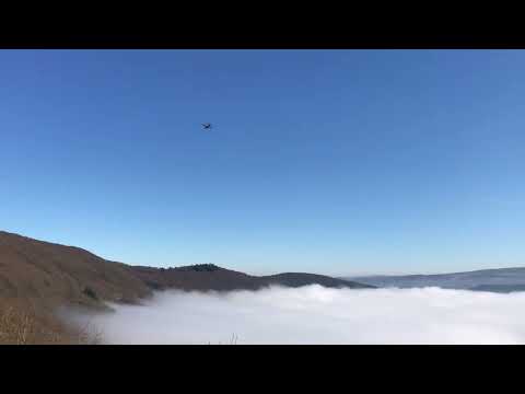 C130s Flying Over a Fogged in Mosel River Valley