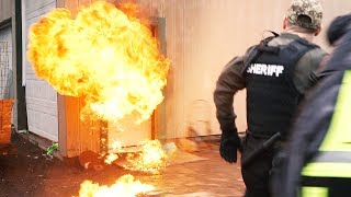 CRAZY SUSPECT ANSWERS THE DOOR WITH A FLAME THROWER!