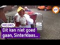 Sinterklaas valt van bakfiets