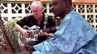 Bruce Cockburn Sings &quot;World of Wonders&quot; in RIver of Sand (Documentary)