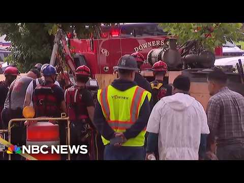Rescuers search for contractors stuck in Illinois storm drain