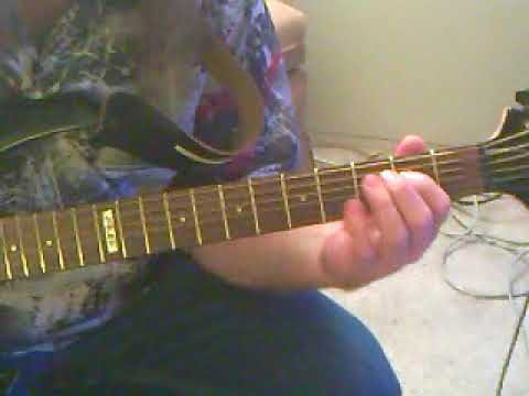 Robby, T. jamming out on his guitar.