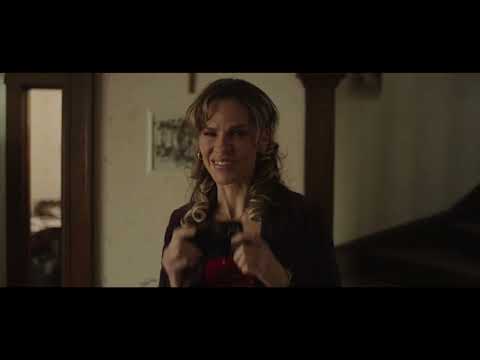 Ordinary Angels official trailer still — Sharon (Hilary Swank) faces a storm as the score swells