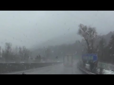 Snow falling on I-70 near Idaho Springs