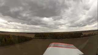 preview picture of video 'Vans RV-6 Landing on the bean field at farmer Chuck's.'