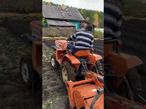 Японский мини трактор вспашка фрезой. Kudota 1200