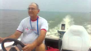 preview picture of video 'An old sailor on Suzuki DT 25HP Ypacaray Lake, San Bernardino, Paraguay'