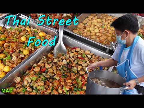 Loads of Thai food arriving at the evening market, ready to sell, Yasothon Thailand 2022.