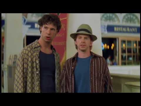 Trailer end card — lights of the charity concert stage as the closing anthem hits