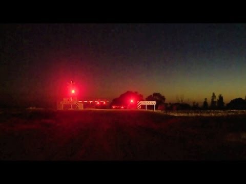 Long Freight Train at Level Crossing in Victoria - PoathTV Australian Grade Crossing