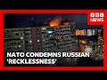Russian drone hits Romanian apartment block | BBC News
