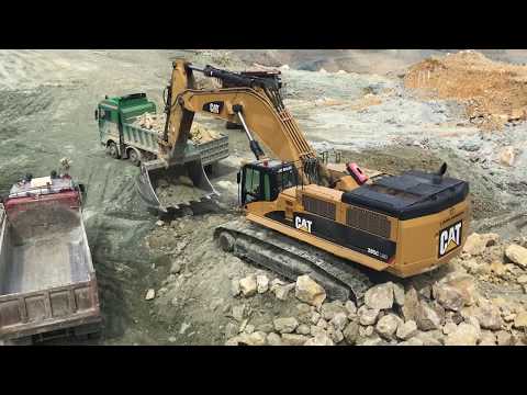 Caterpillar 385C Excavator Loading Trucks And Caterpillar Dumpers - Labrianidis SA