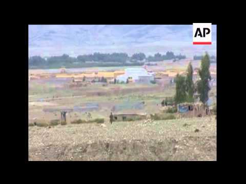 A suicide bomber killed five NATO troops and four Afghan soldiers on Saturday outside a joint Afghan