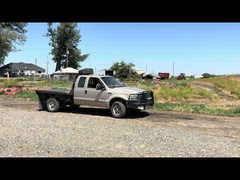 1999  Ford  F350 Super Duty XLT  Extended Cab 4X4 Flatbed Pickup