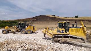 Komatsu 155AX Dozer and CAT 120M Grader in Action