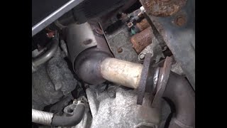 Casues and Fixes Dodge P0422 Code, "Main Catalyst Efficiency Below Threshold (Bank 1)."