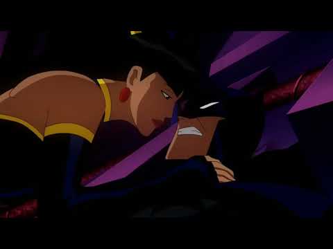 Batman and Superwoman kiss