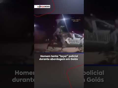 homem tenta laçar policial