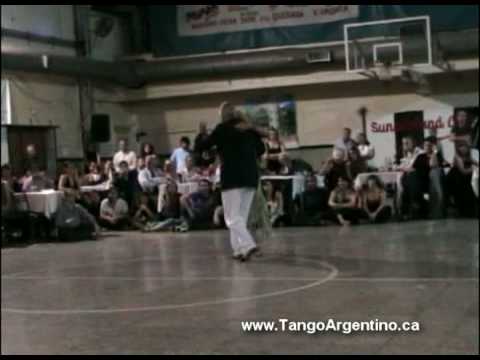  Mary Ann Casas  and  Oscar Casas  are  dancing  to  the  milonga  "  Que Tiempo Aquel  "
