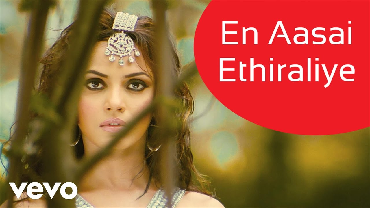 En Aasai Ethiraliye Song Lyrics | Theeradha Vilaiyattu Pillai |  Vinaitha, Vijay Yesudas