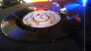 ERNEST WILSON - LOVE MAKES THE WORLD GO AROUND  ( EARLY REGGAE )