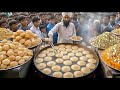 BEST HALWA PURI IN PAKISTAN STREET FOOD INSANE COOKING SKILLS PERFECT CRISPY GOLDEN PURI MAKING