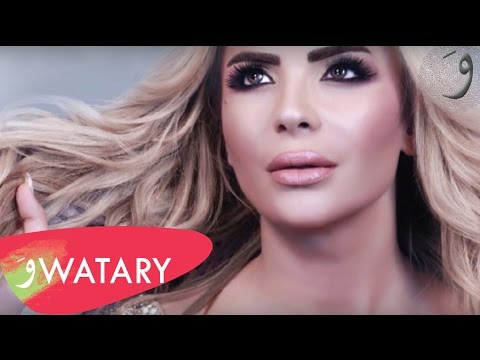 جرحك عندي باسمة