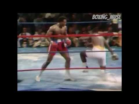 ‪George Foreman lifts Joe Frazier off his feet with a right uppercut!‬
