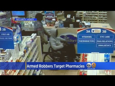 Videos Show Gunman With Prosthesis, Man In Wheelchair Team Robbing Pharmacies