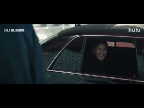 Trailer close-up: nervous smile in fluorescent light during the game
