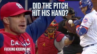 Umpires say this pitch hit Pete Alonso, a breakdown