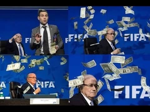 FIFA chief Blatter showered in fake bank-notes by prankster