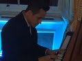 Alexis Sanchez playing 'Right here waiting' on piano