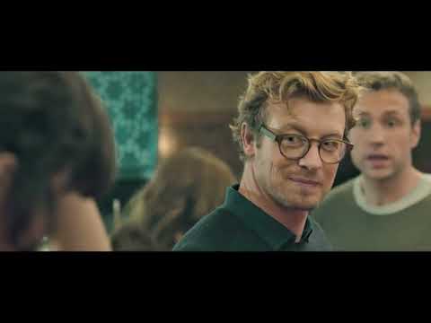 I Give It a Year 2013 trailer frame featuring Rose Byrne and Rafe Spall at their wedding reception
