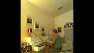 I Know Who Holds My Hand.  Mike PInder.