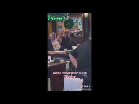 sent a water shot to this big biker guy but without the horrible music